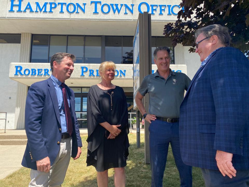 State Sen. Tom Sherman, Gail Huff Brown, former U.S. Sen. Scott Brown speaking with Bob Preston, Jr., at the unveiling of Preston's father's name across the town office building.