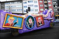 <p>A carnival float, depicting world’s leaders, is pictured during a carnival parade on Rose Monday on Feb. 12, 2018 in Duesseldorf, western Germany.<br> Germany. (Photo: Patrik Stollarz/Getty Images) </p>