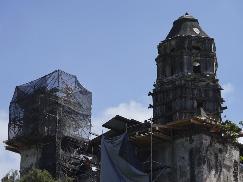 The 1550s-era convent convent of Tepoztlan is under restoration in Morelos state, Mexico, Friday, Oct. 7, 2022. Indigenous symbols were found painted next to Roman Catholic motifs at this convent near Mexico City. (AP Photo/Marco Ugarte)