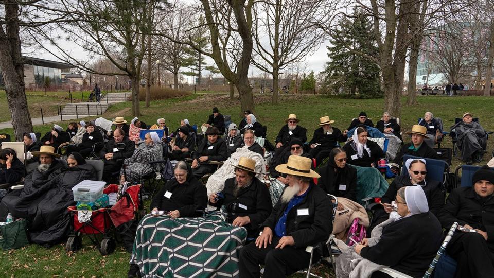 <div>Members of the Amish community sit to watch the Solar Eclipse on April 8, 2024 in Niagara Falls, New York. (Photo by Adam Gray/Getty Images)</div>