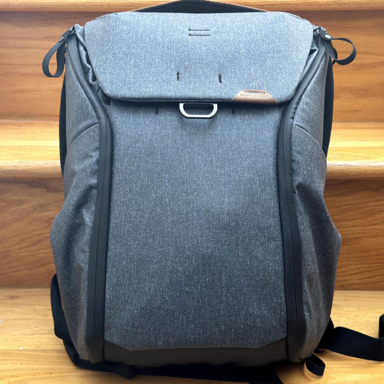 The gray Peak Design backpack sits on top of stairs. (Courtesy Harry Rabinowitz,
Reporter)