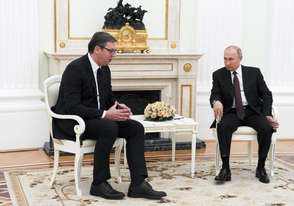 Serbian President Aleksandar Vucic, left, speaks to Russian President Vladimir Putin during their meeting in the Kremlin in Moscow, Russia, Tuesday, June 23, 2020. (Alexei Nikolsky, Sputnik, Kremlin Pool Photo via AP)