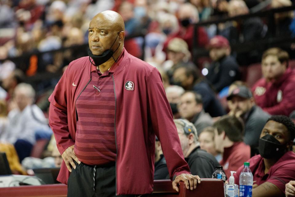 Florida State Seminoles head coach Leonard Hamilton watches as his player shoots a free throw. The Florida State Seminoles defeated the Miami Hurricanes 65-64 Tuesday, Jan. 11, 2022. 