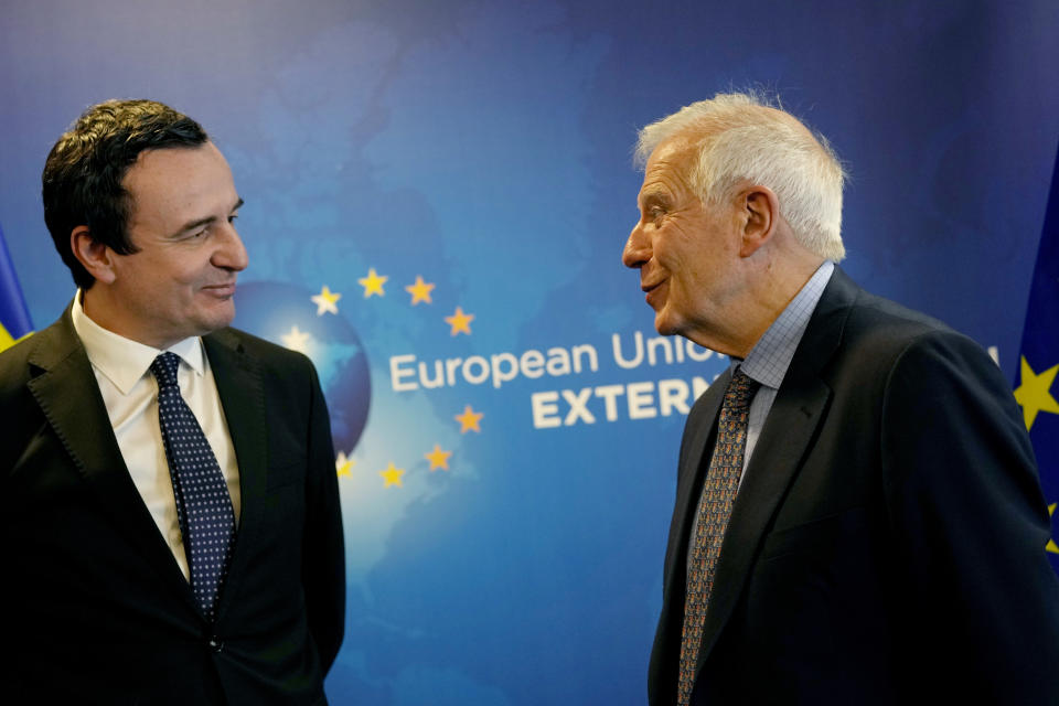 Kosovo's Prime Minister Albin Kurti, left, speaks with European Union foreign policy chief Josep Borrell prior to a meeting in Brussels, Monday, Feb. 27, 2023. The leaders of Serbia and Kosovo are holding talks Monday on European Union proposals aimed at ending a long series of political crises and setting the two on the path to better relations and ultimately mutual recognition. (AP Photo/Virginia Mayo)