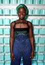 <p>For a private event, Nyong’o went for almost the exact opposite look, with a neutral lip and smokey green eye. <i>(Photo by Todd Williamson/Getty Images for Vanity Fair)</i></p>