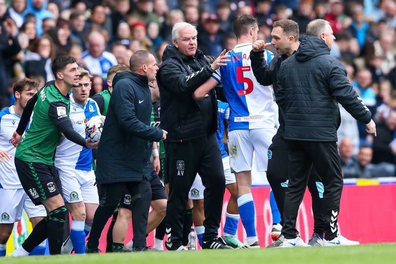 Blackburn Rovers manager John Eustace argues with the fourth official before being sent off.