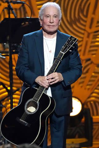 <p>Kevin Mazur/Getty</p> Paul Simon in 2022