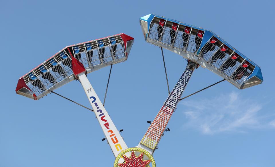 A single person rides the Kamikaze during the Marion County Fair on Friday.