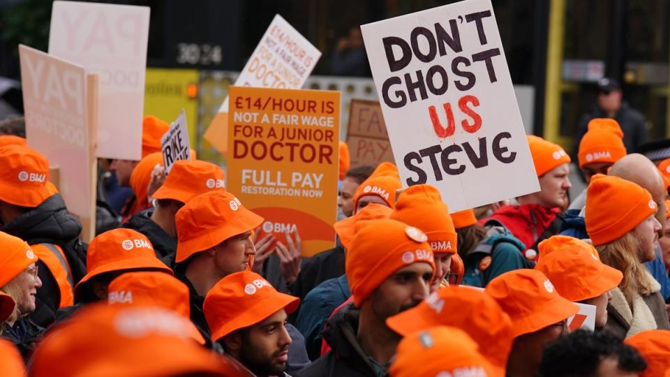 Doctors and medical staff from the British Medical Association (BMA) stage a protest outside the Mancheser Library during the Conservative Party annual conference (Peter Byrne/PA Wire)