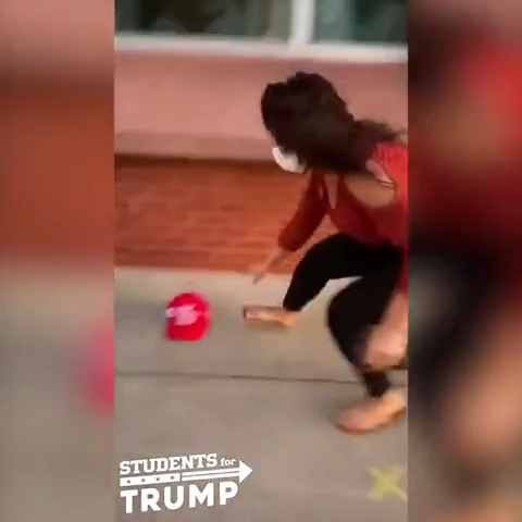The video, posted by the Students for Trump Twitter account, appears to show two women taking a MAGA hat from a boy before getting into an altercation.