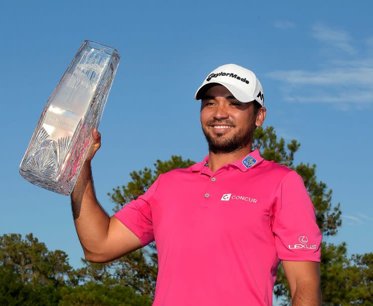 Jason Day celebrates with the trophy during the final round of The Players Championship. (PGA TOUR)