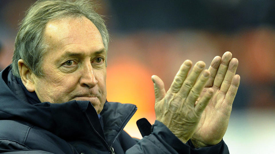 Gerard Houllier is seen here applauding fans during a match.