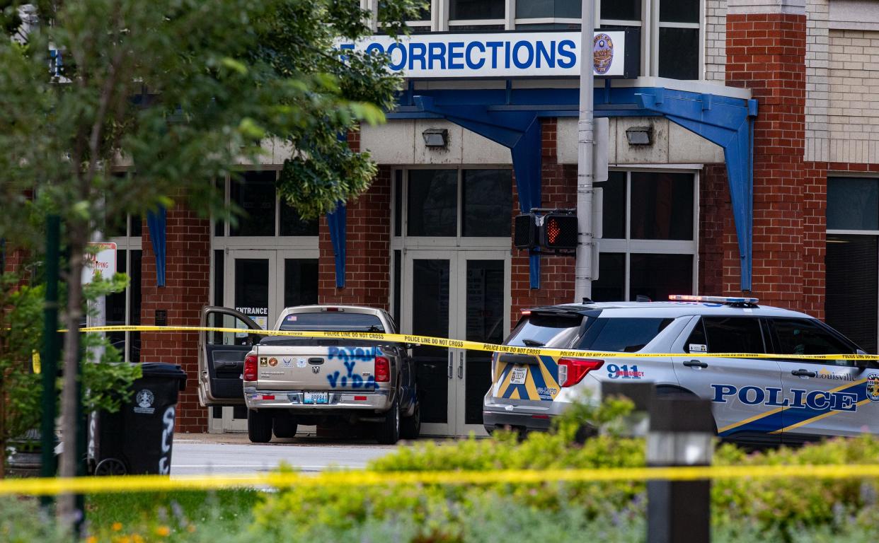 A truck painted with the words 'Patria y vida' is seen after crashing into the Louisville Metro Corrections building on Tuesday, July 13, 2021.