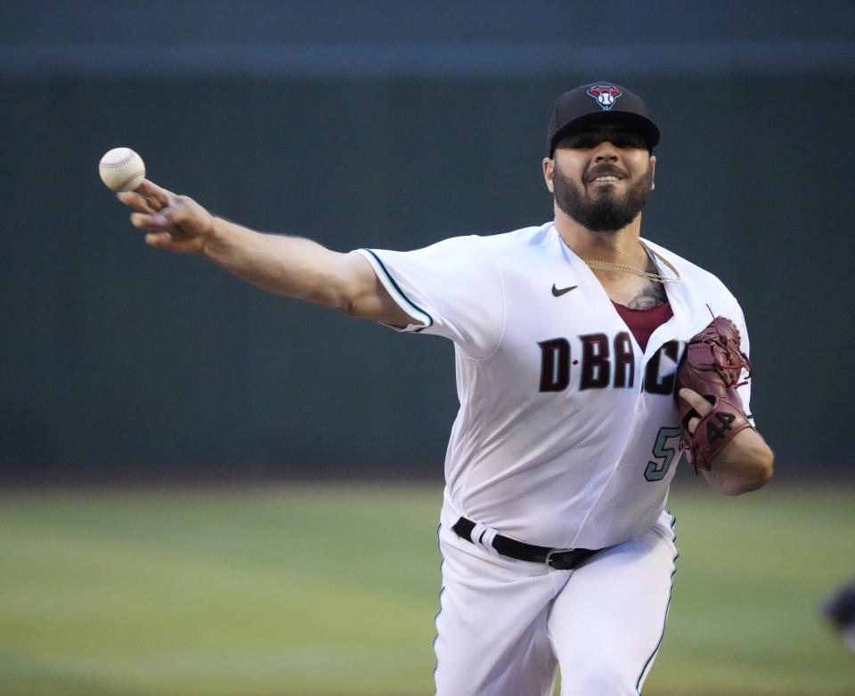 May 31, 2022; Phoenix, Ariz., U.S.; Arizona Diamondbacks relief pitcher Humberto Castellanos (54) throws against the Atlanta Braves during the first inning at Chase Field.