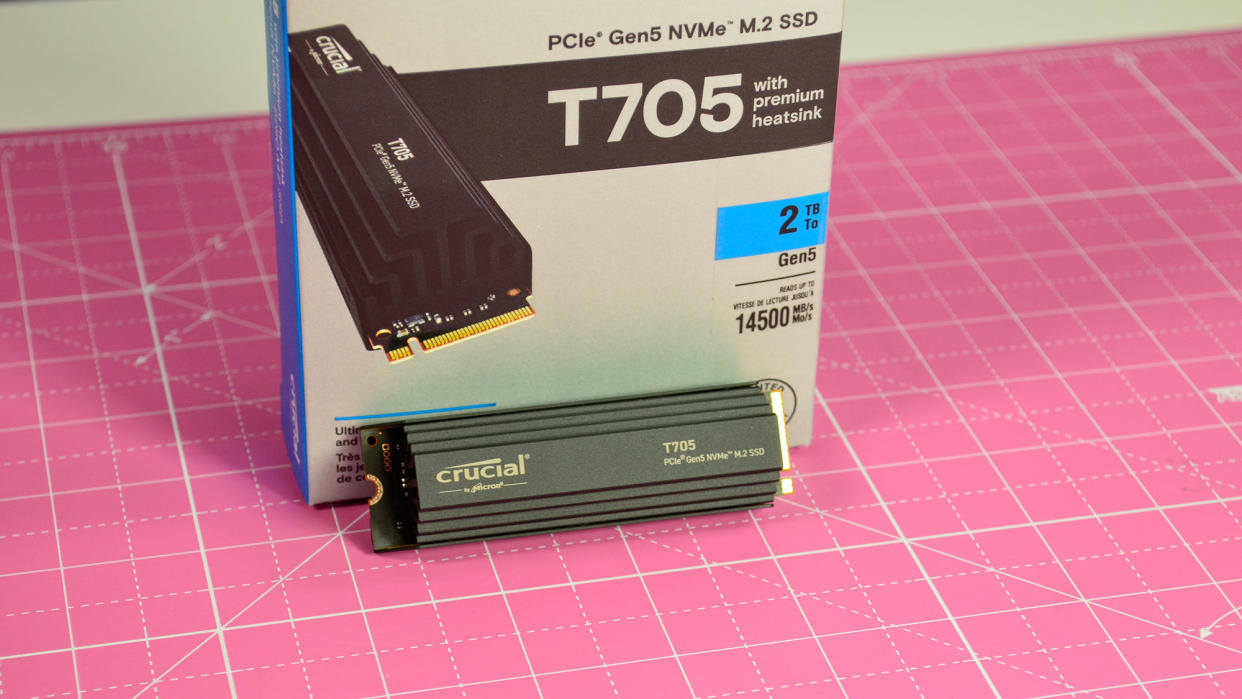  A Crucial T705 SSD on a pink desk mat. 