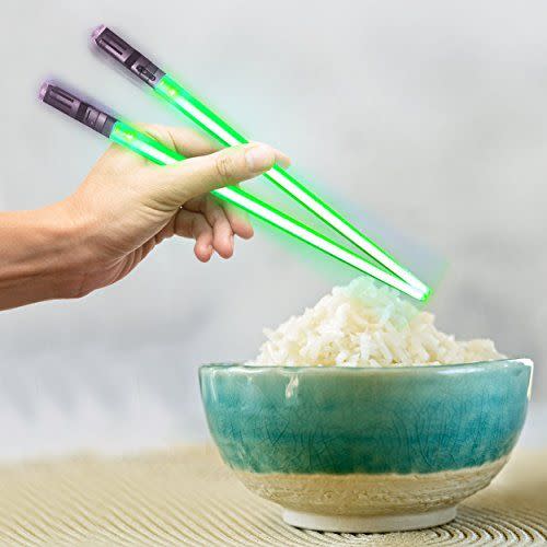 <p><strong>ChopSabers</strong></p><p>amazon.com</p><p><strong>$11.49</strong></p><p><a href="https://www.amazon.com/dp/B01CA2OL7I?tag=syn-yahoo-20&ascsubtag=%5Bartid%7C10055.g.29726186%5Bsrc%7Cyahoo-us" rel="nofollow noopener" target="_blank" data-ylk="slk:Shop Now;elm:context_link;itc:0;sec:content-canvas" class="link ">Shop Now</a></p><p>Whether they love Star Wars or not, they'll get a kick out of these chopsticks that light up. Reviewers say they are easy to clean, and are a big hit with tweens.</p>