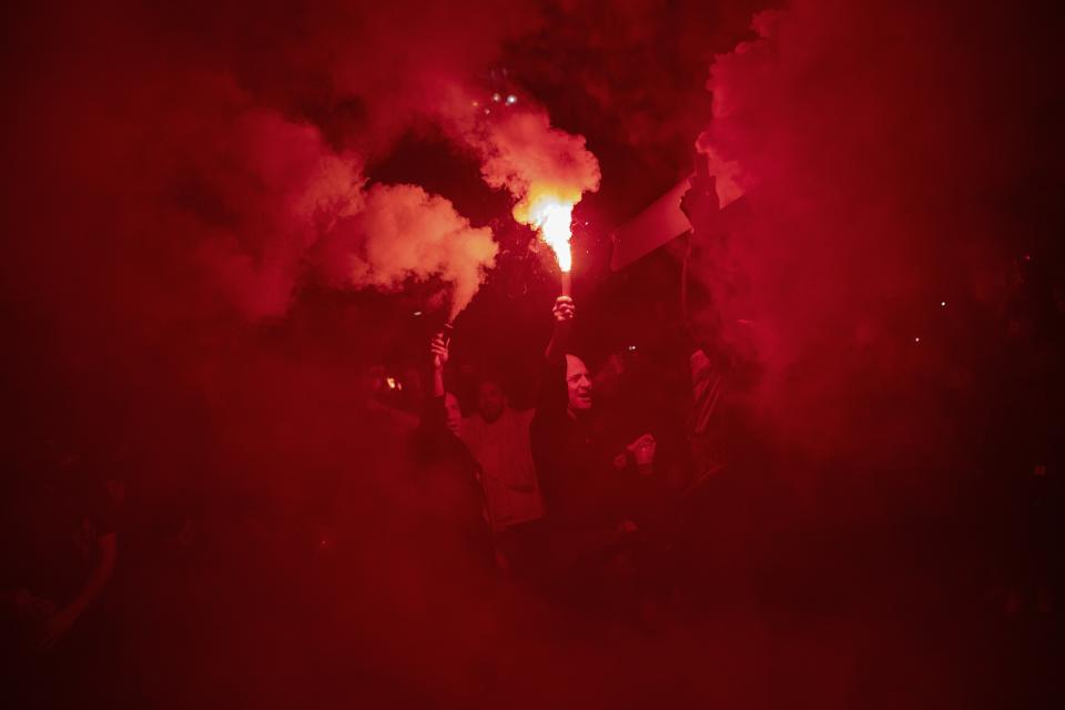 Right wing pro-Spanish unity supporters light flares during a demonstration in Barcelona, Spain, Oct. 17, 2019. (Photo: Bernat Armangue/AP)