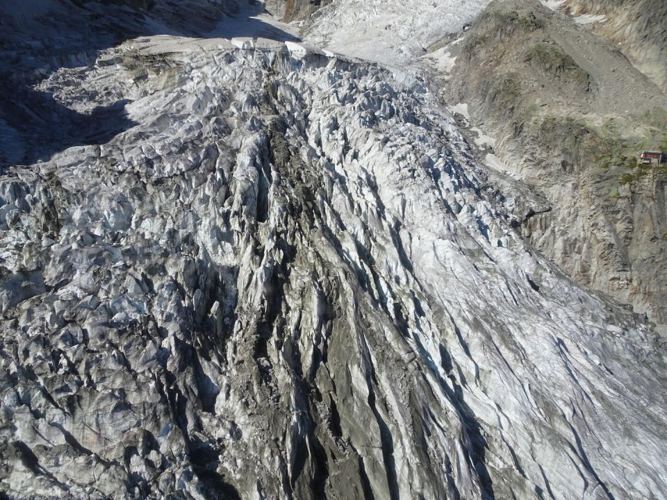 This photo taken on Friday, Sept. 20, 2019 shows the massive Planpincieux glacier, located in the Alps on the Grande Jorasses peak of the Mont Blanc massif, which straddles the borders of Italy, France and Switzerland and contains the highest peak in Western Europe. The fast-moving Italian glacier is melting quickly, threatening a picturesque valley near the Alpine town of Courmayeur and prompting the mayor to close down a mountain road. Mayor Stefano Miserocchi has forbidden access to a section of the Val Ferret, outside of Courmayeur, a popular hiking area on the south side of the Mont Blanc massif. (Comune di Courmayeur, Fondazione Montagna Sicura via AP)