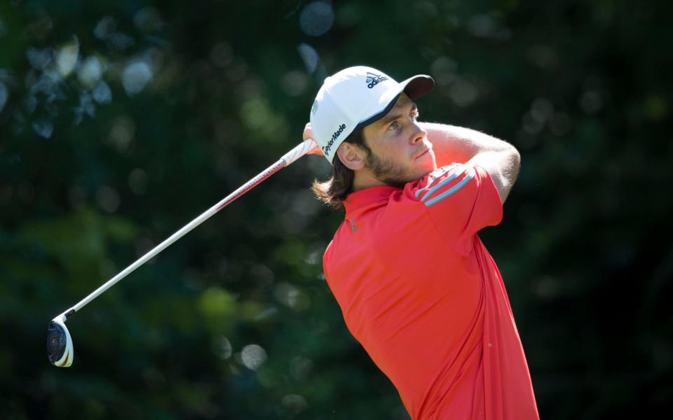 Gareth Bale playing golf - GETTY IMAGES