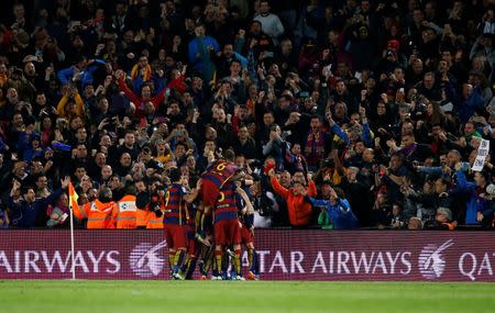 Football Soccer - FC Barcelona v Real Madrid - La Liga - Camp Nou, Barcelona - 2/4/16 Barcelona's Gerard Pique celebrates scoring their first goal with teammates Reuters / Juan Medina Livepic