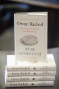 Supreme Court Justice Neil Gorsuch poses for a portrait in his office at the Supreme Court, Monday, July 29, 2024, in Washington. Gorsuch is out with a new book in which he says ordinary Americans are "getting whacked" by too many laws and regulations. "Over Ruled: The Human Toll of Too Much Law" is being published on Tuesday, Aug. 6. (AP Photo/Rod Lamkey, Jr.)