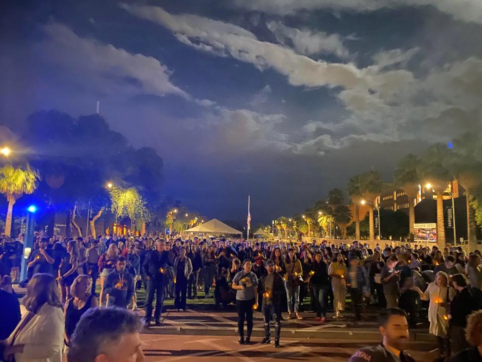 Students, staff and community members gathered in remembrance of slain professor Thomas Meixner at the University of Arizona campus on Oct. 7, 2022. Sarah Lapidus/The Republic
