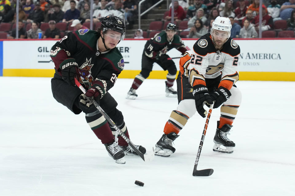 Arizona Coyotes center Barrett Hayton (29) skates away from Anaheim Ducks defenseman Kevin Shattenkirk (22) during the second period of an NHL hockey game Friday, April 1, 2022, in Glendale, Ariz. (AP Photo/Rick Scuteri)