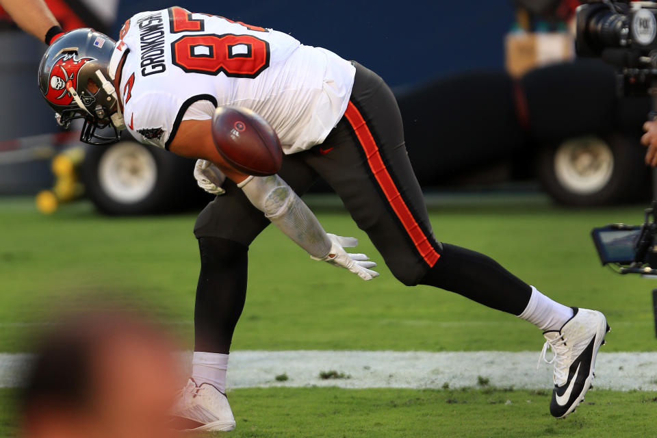 Rob Gronkowski spikes the ball after scoring a touchdown.