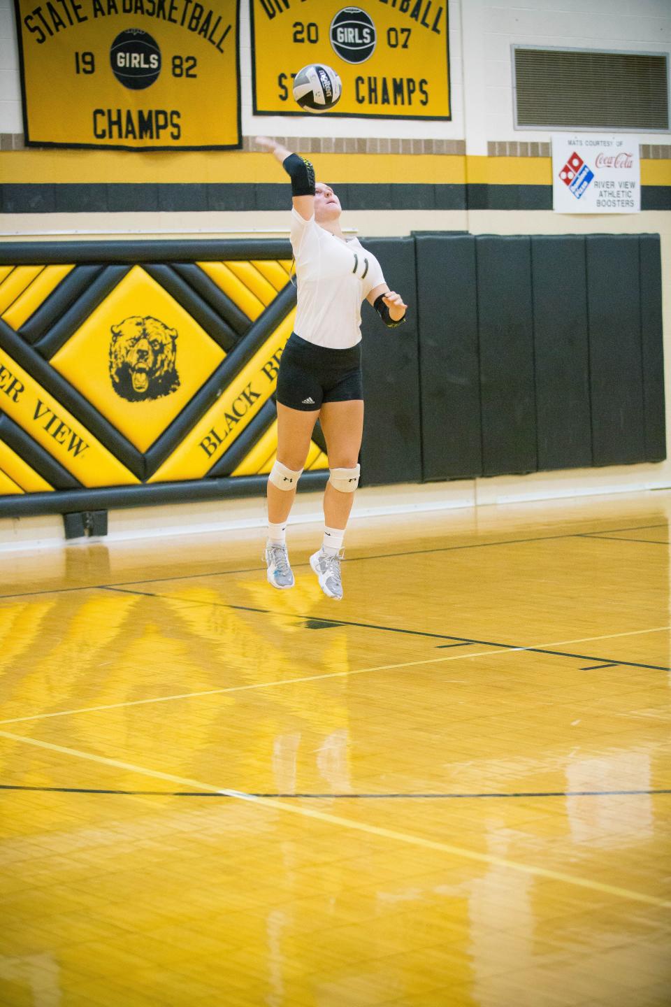 River View's Kayla Dulgar serves during Thursday's home match with Maysville. The Lady Bears won in three sets.