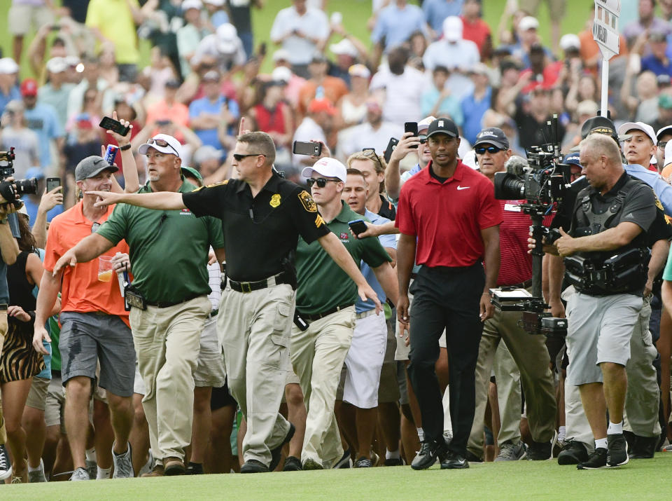 File- This Sept. 23, 2018, file photo shows Tiger Woods making his way down the 18th fairway during the final round of the Tour Championship golf tournament in Atlanta. Woods said Tuesday, Jan. 22, 2019, he doesn't think he can ever feel that kind of energy again. (AP Photo/John Amis, File)