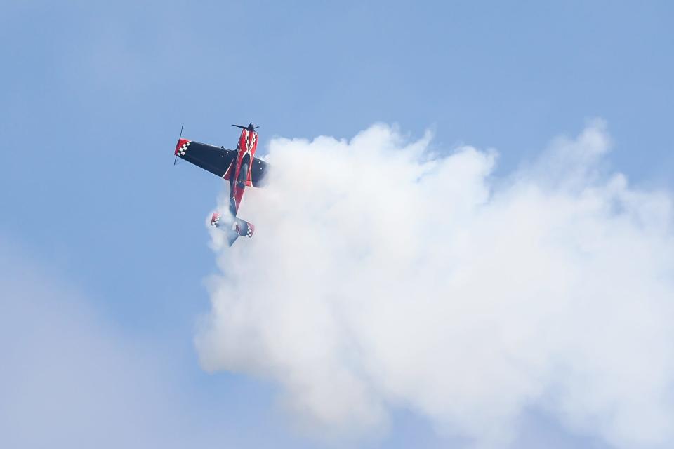 Rob Holland, a highly accomplished aerobatic pilot, performs aerial tricks in his stunt plane at the 34th Hampton Beach Seafood Festival on Saturday, Sept. 9, 2023.