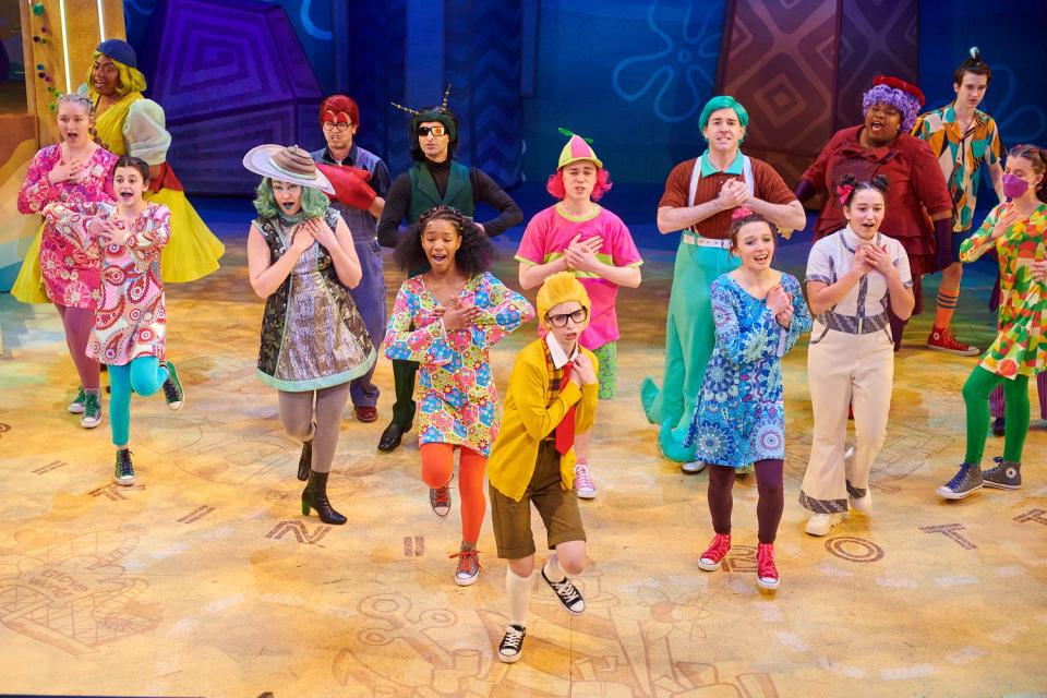 Gracie Halverson, center, and company perform in "The SpongeBob Musical for Young Audiences," produced by First Stage.