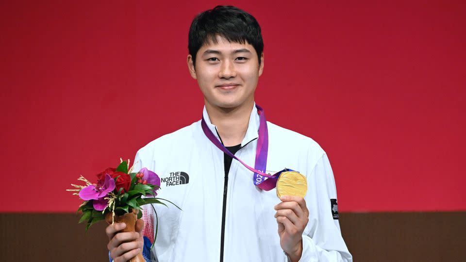 Winning a gold medal at the Asian Games, like Oh Sang-uk achieved in the men's sabre this year in Hangzhou, means South Korean men earn an exemption from military duty. - Wang Zhao/AFP/Getty Images