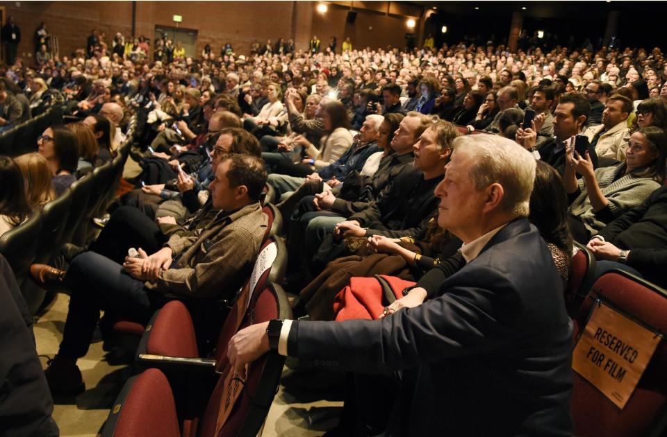 Former U.S. Vice President Al Gore, right, listens to introductory remarks for the film "An Inconvenient Sequel: Truth to Power," at the premiere of the film at the Eccles Theater during the 2017 Sundance Film Festival on Thursday, Jan. 19, 2017, in Park City, Utah. (Photo by Chris Pizzello/Invision/AP)