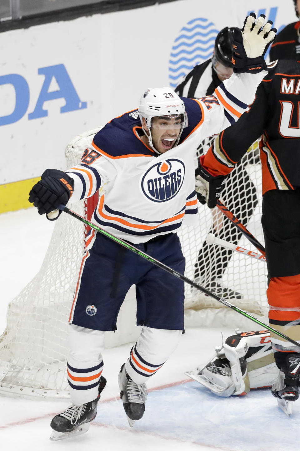 Edmonton Oilers left wing Andreas Athanasiou celebrates after scoring during the third period of an NHL hockey game against the Anaheim Ducks in Anaheim, Calif., Tuesday, Feb. 25, 2020. The Ducks won 4-3. (AP Photo/Chris Carlson)