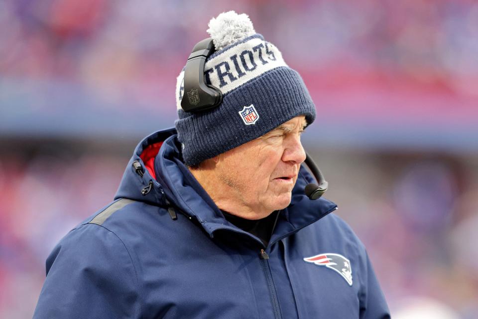 ORCHARD PARK, NEW YORK - JANUARY 08: Head coach Bill Belichick of the New England Patriots watches his team play during the third quarter against the Buffalo Bills at Highmark Stadium on January 08, 2023 in Orchard Park, New York. (Photo by Bryan M. Bennett/Getty Images)