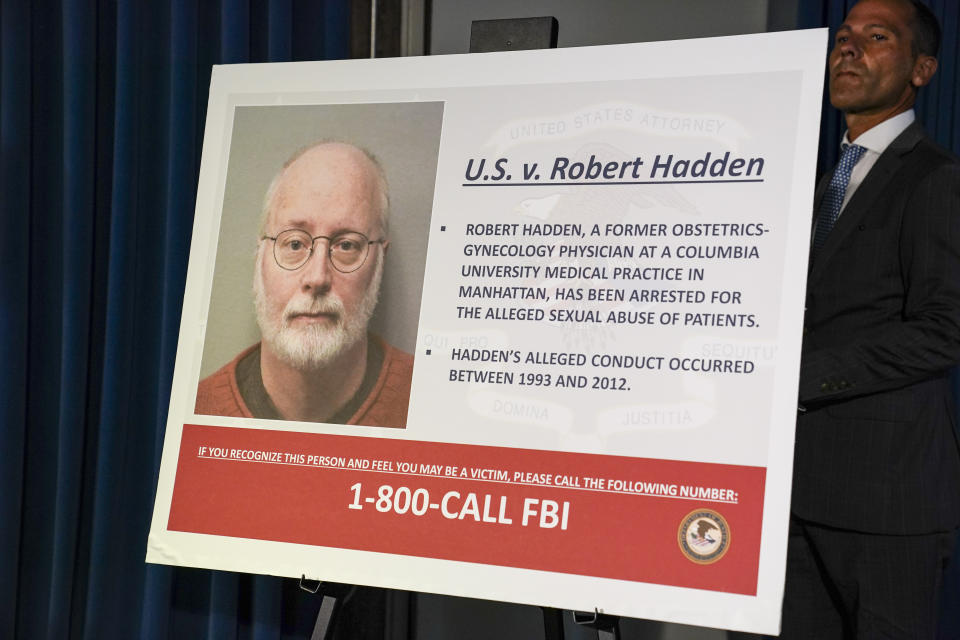 A board bearing a image of Robert Hadden is displayed before the arrival of Audrey Strauss, Acting United States Attorney for the Southern District of New York, and William F. Sweeney Jr., Assistant Director-in-Charge of the New York Office of the Federal Bureau of Investigation, at a news conference to announce his arrest and indictment, Wednesday, Sept. 9, 2020, in New York. Former New York gynecologist Hadden, accused of sexually abusing more than two dozen patients, including the wife of former presidential candidate Andrew Yang, was charged with six counts of inducing others to travel to engage in illegal sex acts. (AP Photo/John Minchillo)