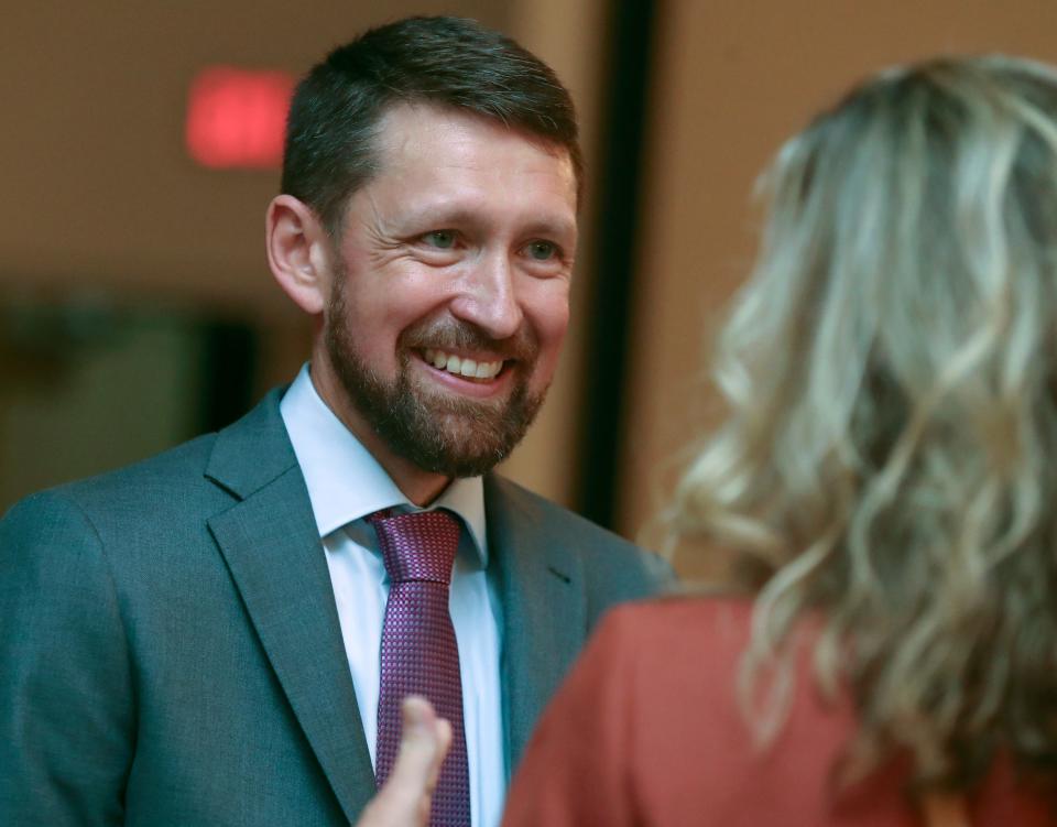 Cory Hafer of Middletown High School is congratulated after being named the 2024 Delaware State Teacher of the Year. Hafer, of the Appoquinimink School District, was one of 20 district teachers of the year honored in a gathering in Dover, Wednesday, Oct. 18, 2023.