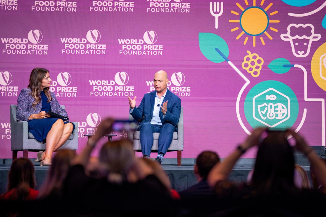 Farmer Julie Kenney and Chuck Magro, CEO of Corteva Agriscience, have a Fireside Chat about the challenges farmers face during the Borlaug International Dialogue held by the World Food Prize Foundation.