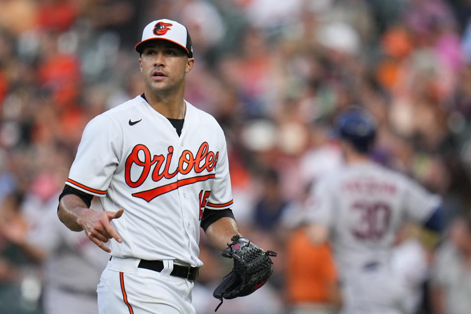 Baltimore Orioles starting pitcher Jack Flaherty looks on as Houston Astros' Kyle Tucker (30) runs the bases after hitting a two-run home run off him in the first inning of a baseball game, Wednesday, Aug. 9, 2023, in Baltimore. Astros' Jose Altuve scored on the home run. (AP Photo/Julio Cortez)