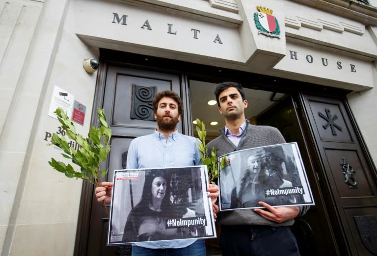 Matthew Caruana Galizia (L) and Paul Caruana Galizia, the sons of murdered Maltese journalist Daphne Caruana Galizia, attended a vigil in London on Thursday to mark the six-month anniversary of the killing