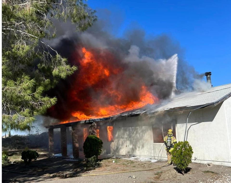Firefighters faced high-winds while battling a single-story house fire just north of Highway 18 in Phelan.