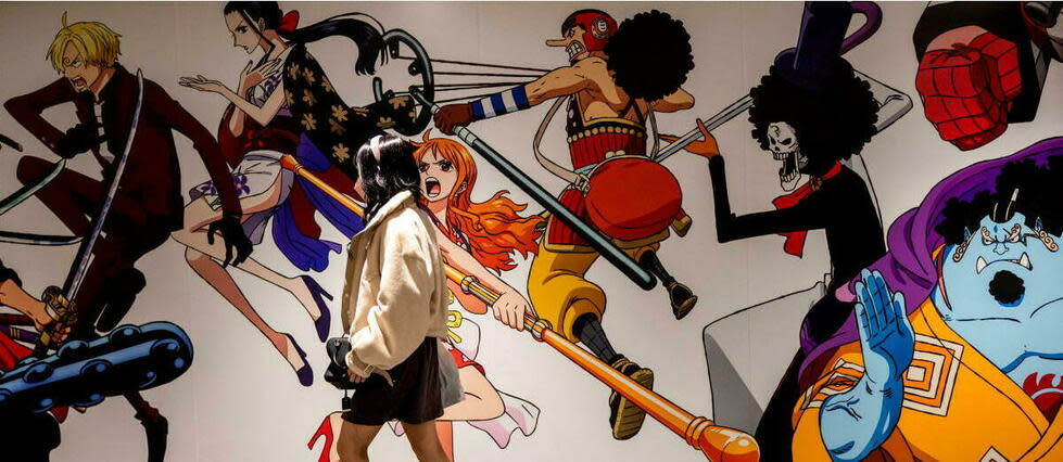 Dans le métro de Tokyo, décoré avec les personnages de One Piece, à l'occasion de la sortie d'un épisode du manga.    - Credit:BEHROUZ MEHRI / AFP