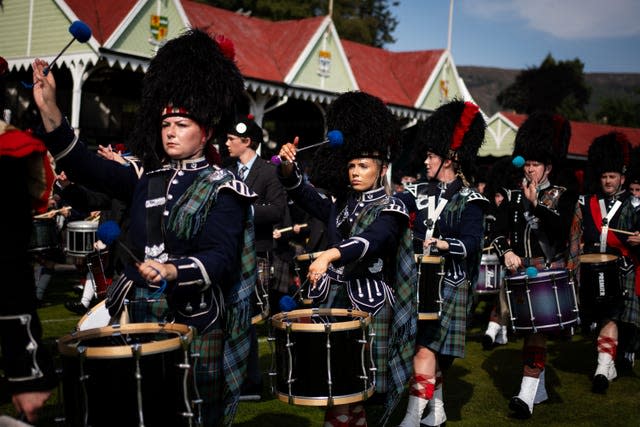 Drummers marching at the Braemar Gathering