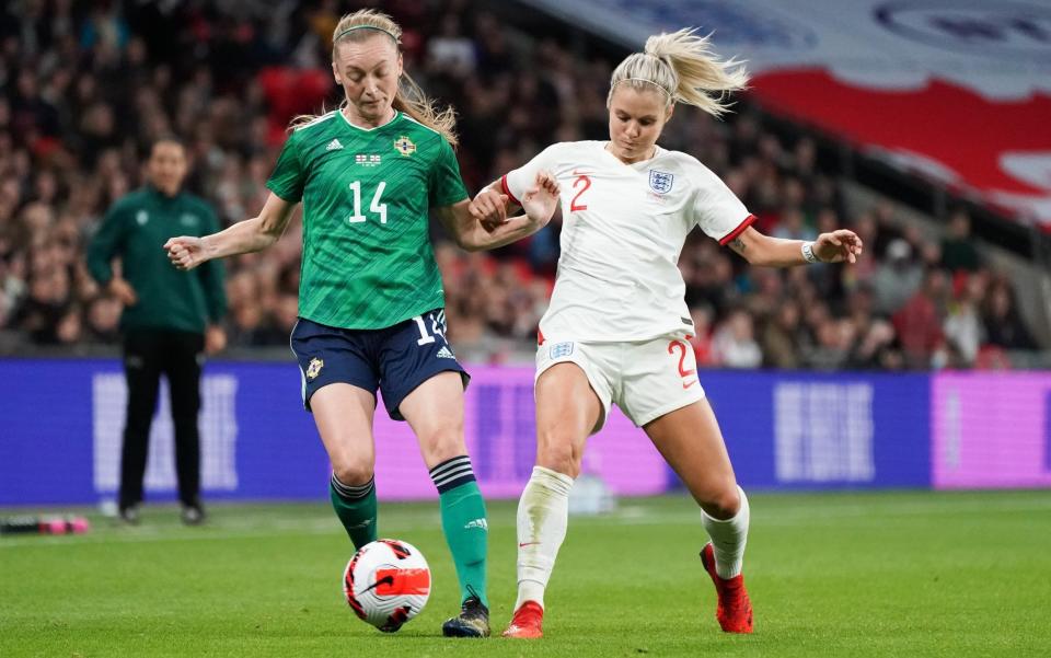 Northern Ireland's Lauren Wade under pressure from England's Rachel Daly - CameraSport