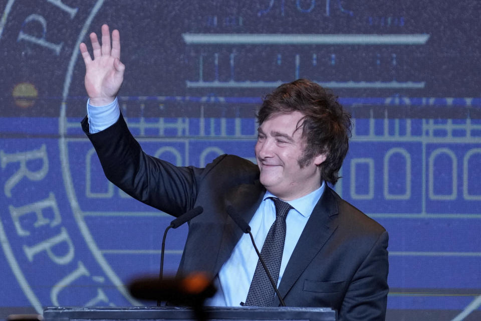 Presidential candidate of the Liberty Advances coalition Javier Milei waves during his victory speech after being elected president in a runoff election in Buenos Aires, Argentina, Sunday, Nov. 19, 2023. (AP Photo/Natacha Pisarenko)