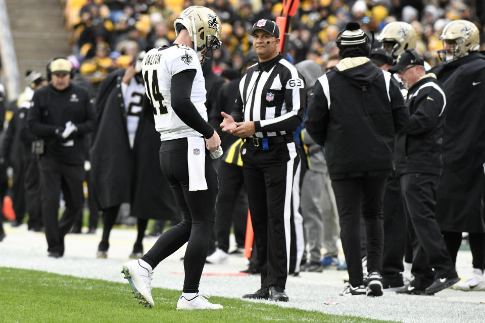 New Orleans Saints quarterback Andy Dalton (14) walks off the field during the first half of an NFL football game against the Pittsburgh Steelers in Pittsburgh, Sunday, Nov. 13, 2022. (AP Photo/Don Wright)