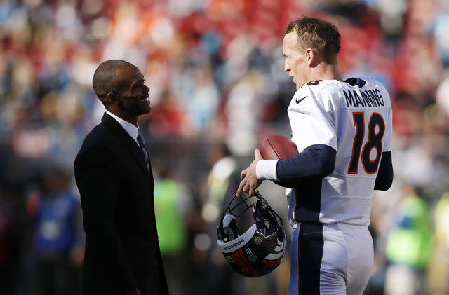 Photo by Ezra Shaw/Getty Images Marvin Harrison on the sideline with Peyton Manning.