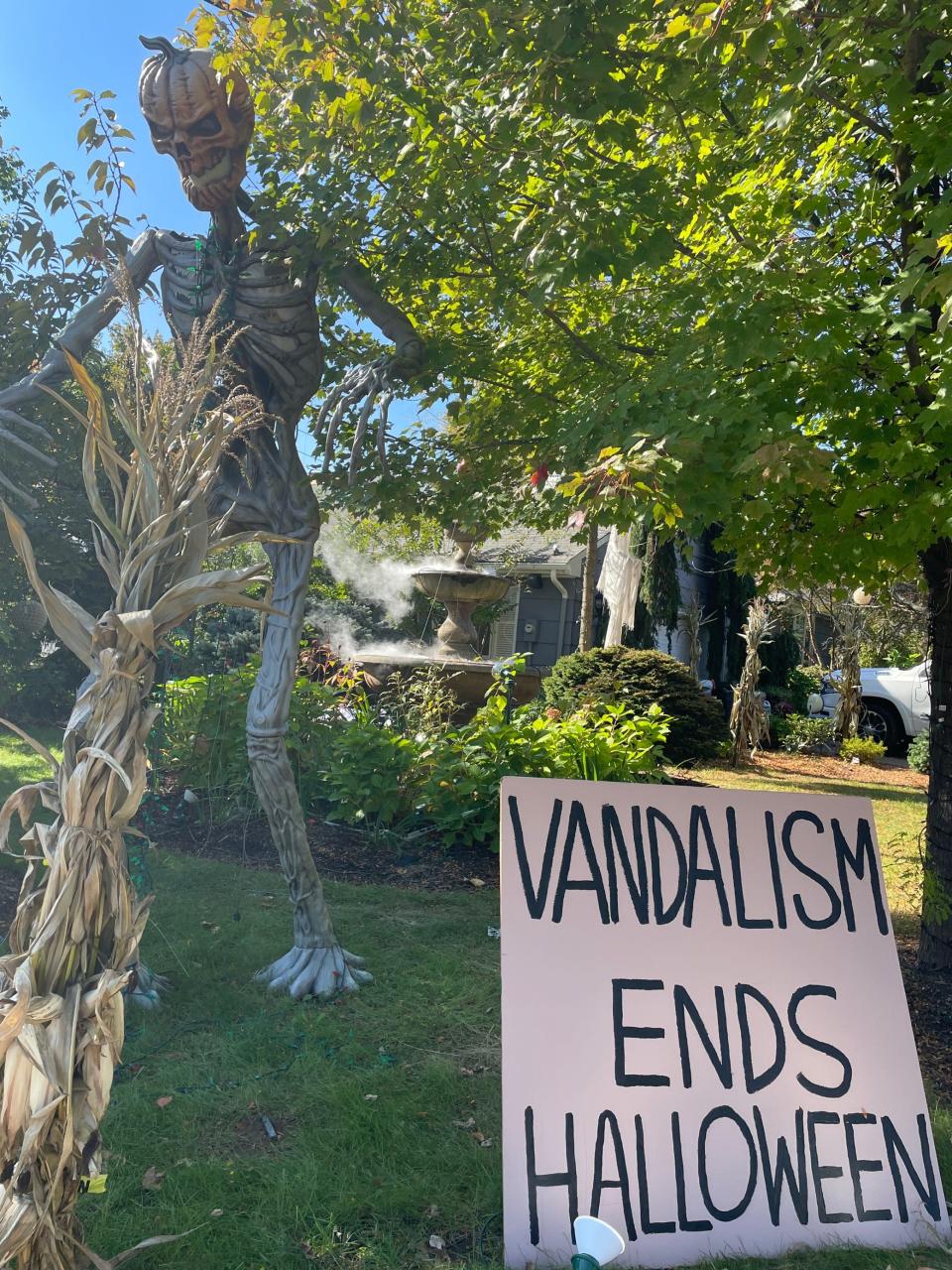 The annual Halloween display by Dr. Wayne Gangi on Grove Street has been taken down and replaced by a sign following vandalism.