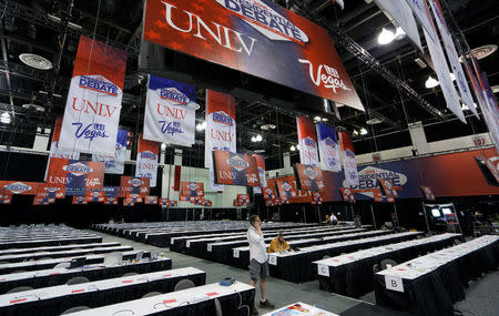 Final preparations are made to the media workspace at the University of Las Vegas for the last 2016 U.S. presidential debate in Las Vegas October 17, 2016. REUTERS/Rick Wilking